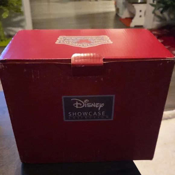 Jim Shore Disney Sculpture with Pink and Red Accents